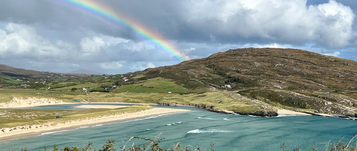 Rainbow over the coast hills of Ireland